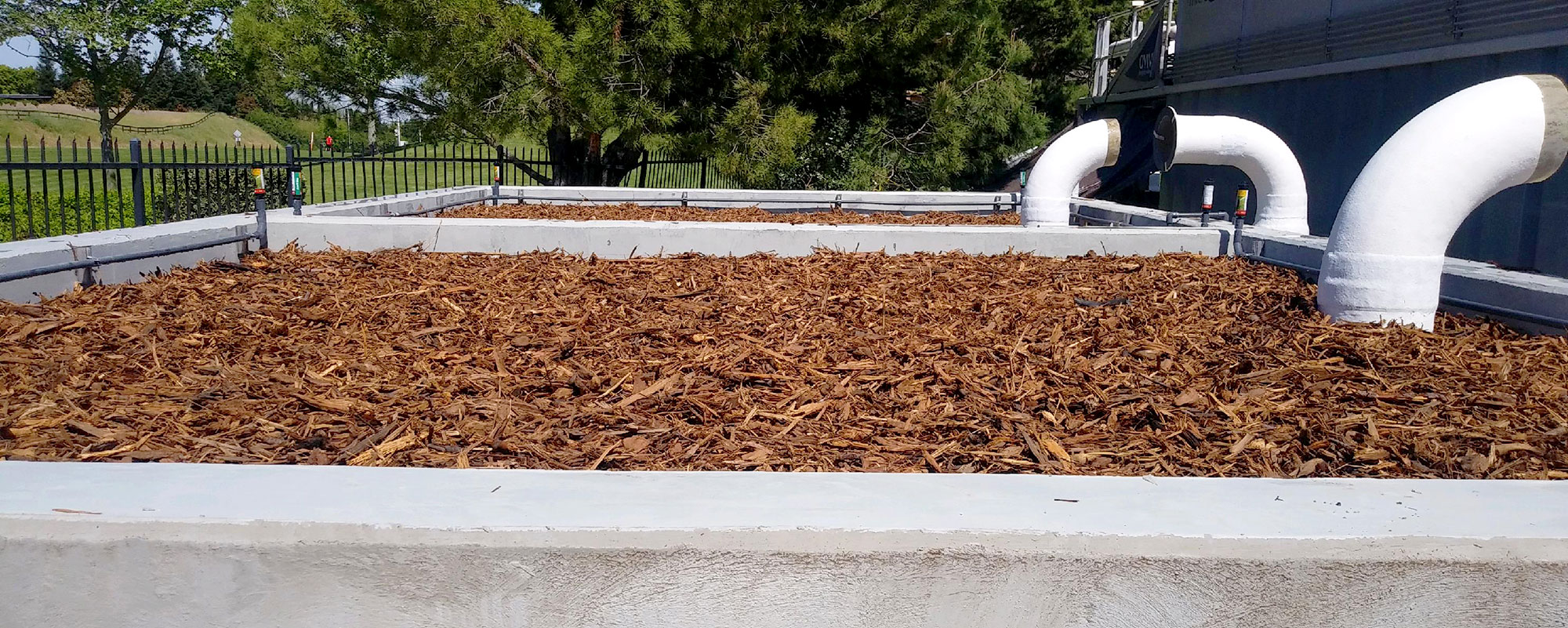 Wood chips like GES Biotek’s Fiber-Max contain natural properties that make them effective in odor control